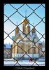 За решеткой